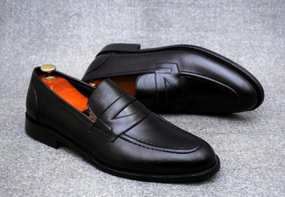 Mocassin classique (marque Clarks) en cuir style penny loafer