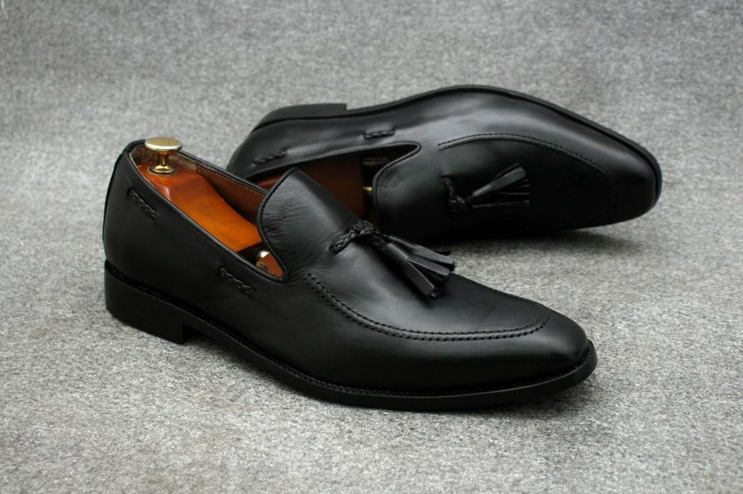 Mocassins en cuir pour hommes avec pompons